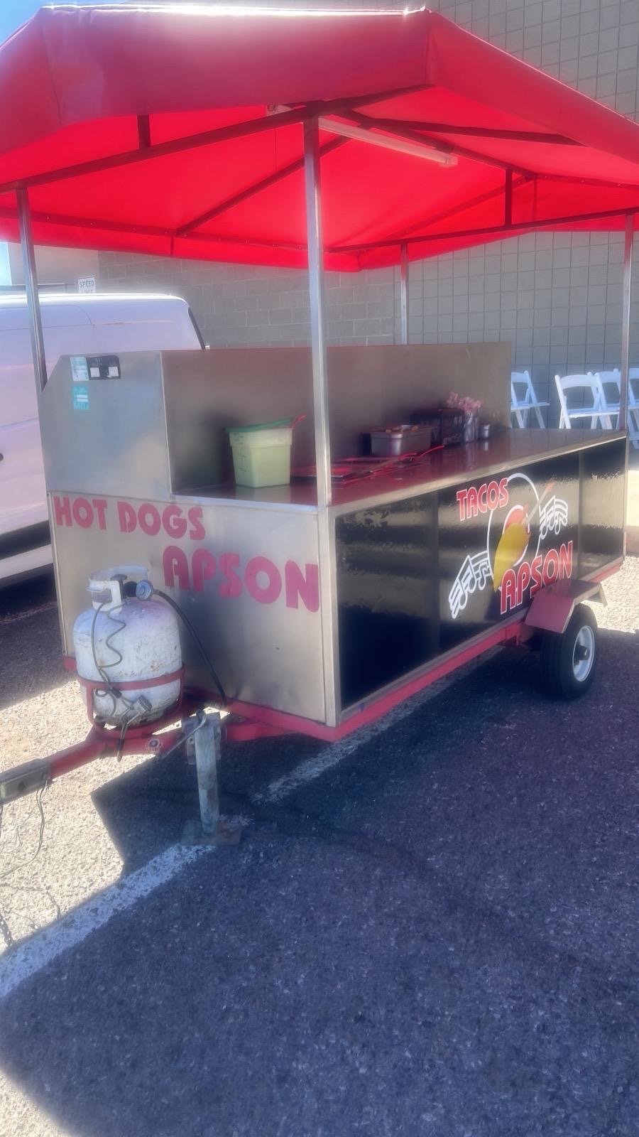 The Tacos Apson catering trailer set up at an outdoor event